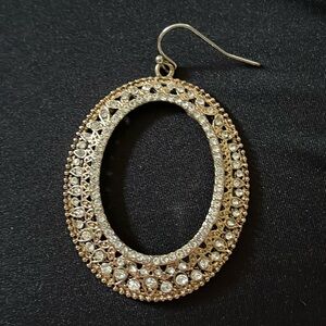 Oval gold and rhinestone dangle earring. Beautiful and goes with everything!